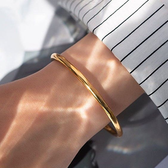 This solid round cut heavy slave bangle