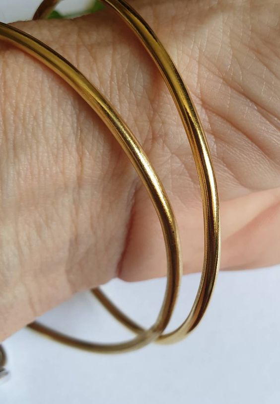 This solid round cut heavy slave bangle