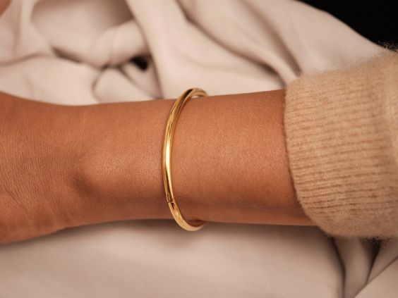 This solid round cut heavy slave bangle